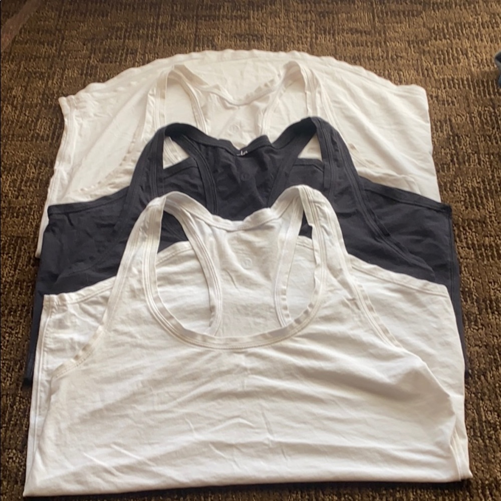 Lot of three lululemon tank 2 white 1 black